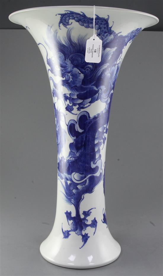 A large Japanese blue and white trumpet shaped vase, by Makuzu Kozan II (Miyagawa Hanzan, 1858-1940), 59.5cm, two hairline rim cracks